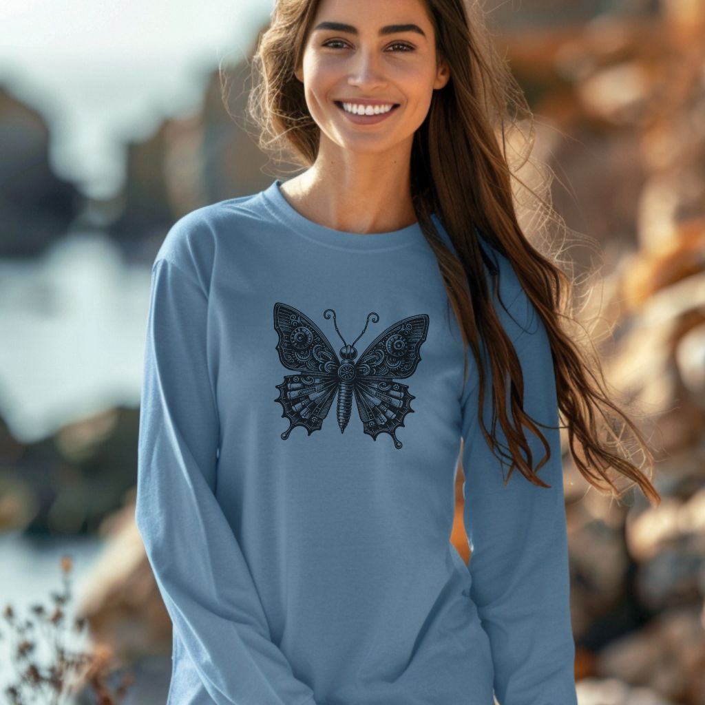 Woman wearing a long sleeve nature shirt with a butterfly on it