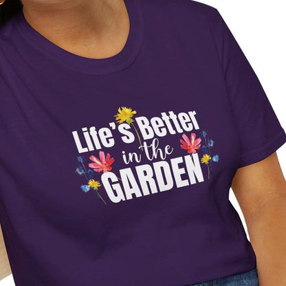 Girl wearing a Gardening t-shirt that says Life's Better in the Garden and has lots of colorful flowers back