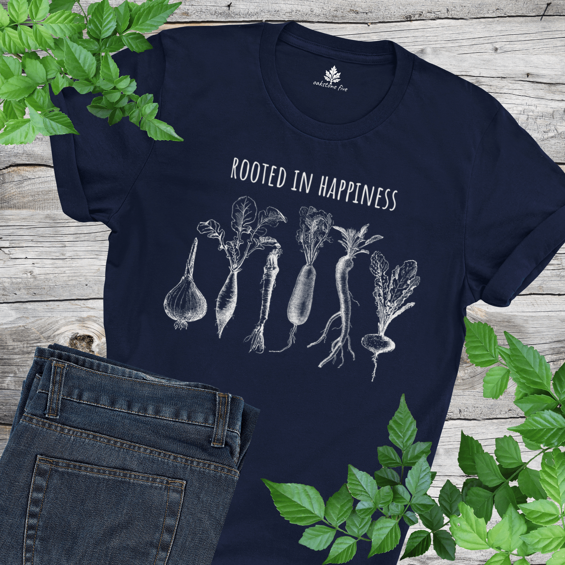 Navy gardening tee shirt with vegetables on it and says Rooted in Happiness