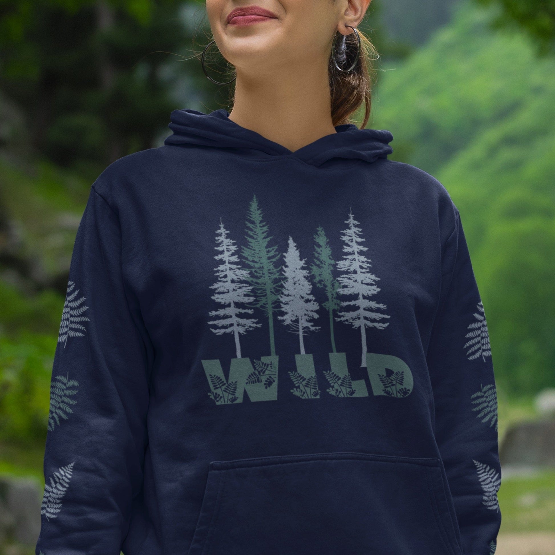 Navy nature lover's hoodie with pine trees and says WILD